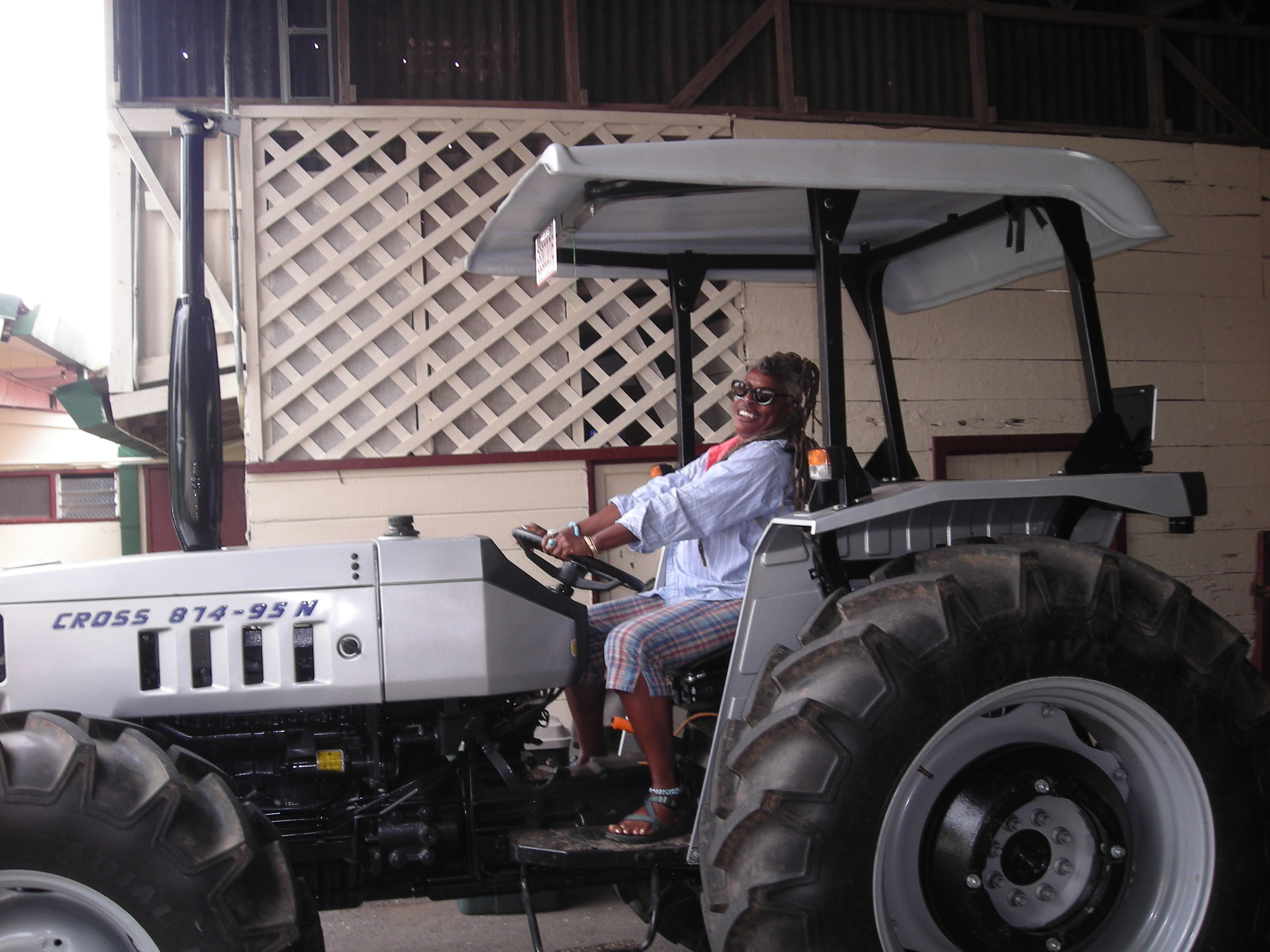 DePrator on one of the tractors at Doka Coffee Plantation